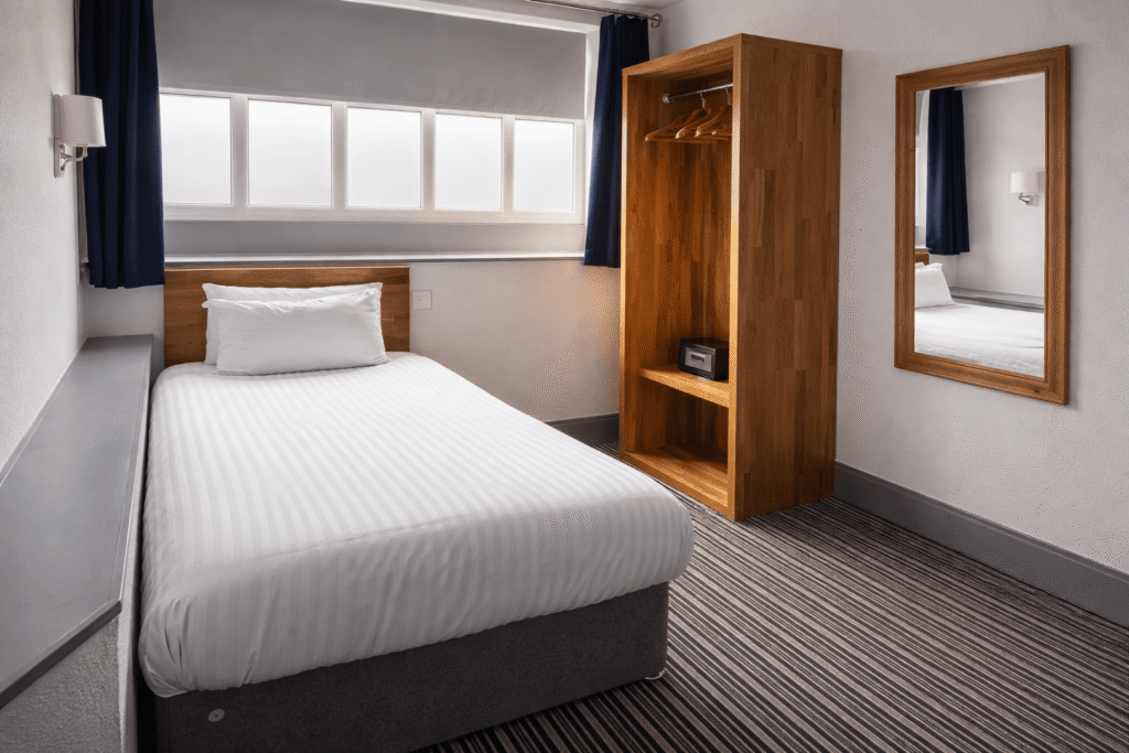 Single room at Valley Hotel Anglesey with comfortable bed and en-suite facilities