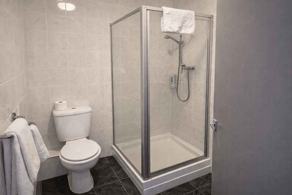 Single room bathroom with walk-in shower at Valley Hotel in Valley near Holyhead