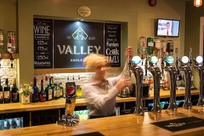 Restaurant and bar at Valley Hotel Anglesey serving food and drinks