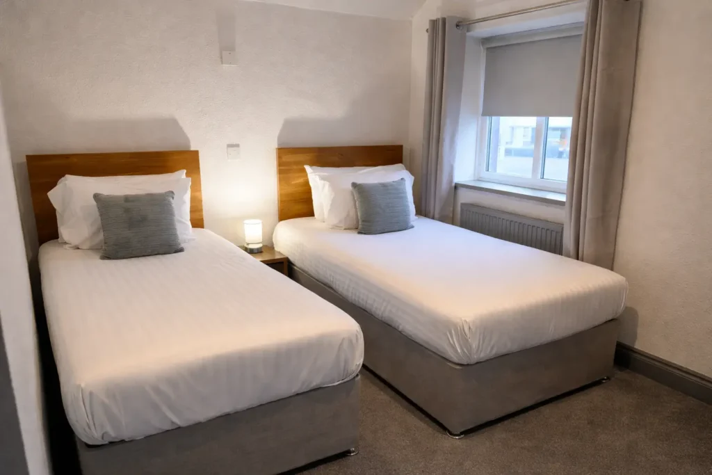 Modern twin room with two single beds at Valley Hotel Anglesey