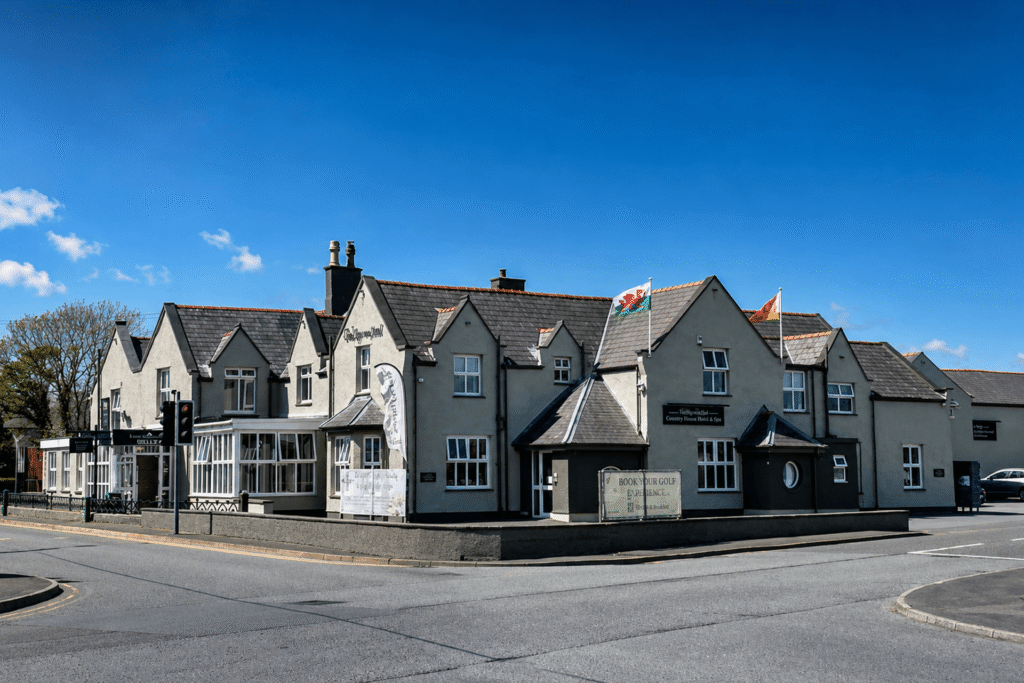 Front exterior view of Valley Hotel Anglesey in Valley, Holyhead, North Wales on a bright sunny day.